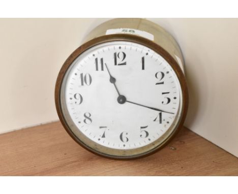 A early 20th century brass cylindrical table clock mechanish, marked to back 'France', w9.5cm
