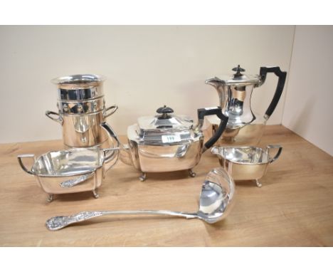 An 4 piece silver plated tea set raised on simple swept supports, to include tea pot, coffee pot and ladle, ( 6 )