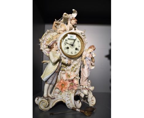 A late 19th century Sitzendorf / Thuringia porcelain mantel clock having single bell strike, the hood decorated with acanthus