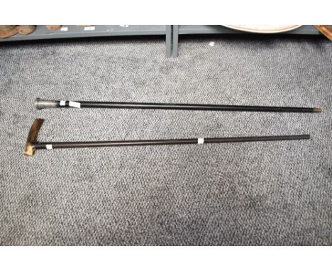 An early 20th century ebonised walking stick, having a silver mounted top decorated with acanthus leaf, hallmarked for London