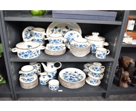 A Midwinter Stonehenge pattern dinner service decorated with blue floral patterns, to include soup bowls, lidded pots and pla