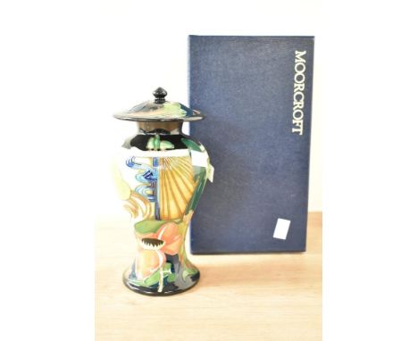 A Moorcroft 'Ryden Fields' pattern jar and cover, of lobed form, painted and printed marks, dated code for 2006, h22cm
