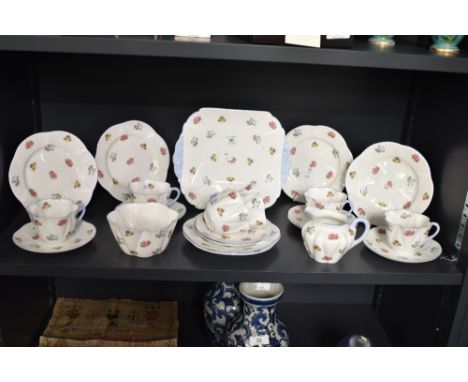 A Shelley 'Forget-Me-Not' pattern fine bone china tea service decorated with pink roses, yellow, purple pansies and blossoms 
