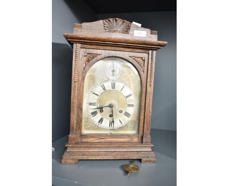 An late 19th oak cased bracket clock, having Westminister chimes, the movement marked 'Gustav Becker', h42cm