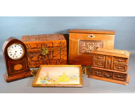 An Art Nouveau Oak Stationery Box, the fall front with copper panel together with a Black Forest jewellery box, another carve