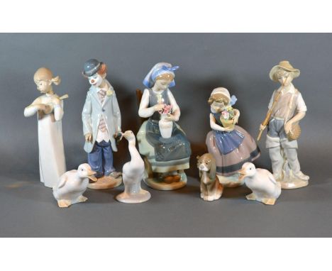 A Lladro Figurine of a Seated Girl with a Vase of Flowers, together with four other Lladro figures, a Lladro model of a duck,