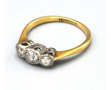 An 18ct Gold and Platinum Three Stone Diamond Ring 