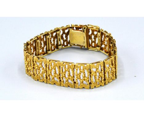 A 9ct. Gold Panel Bracelet of pierced form, 33 gms. 