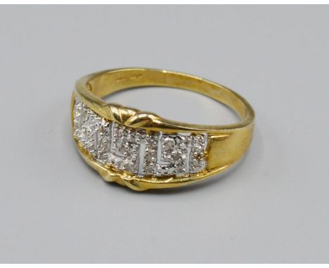 A 9ct Gold Diamond Band Ring of Pierced Form, 4 grams, ring size T 