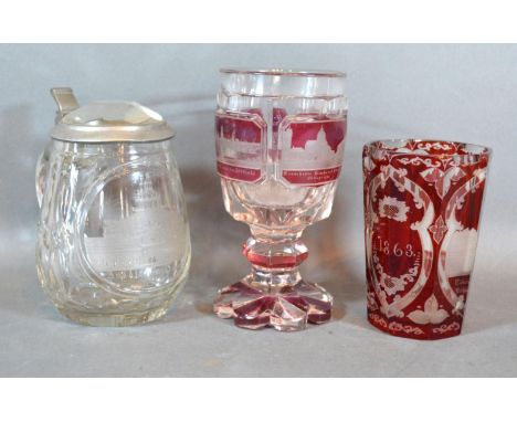 A Bohemian Ruby Glass Beaker together with a similar Goblet and a clear glass lidded Tankard 