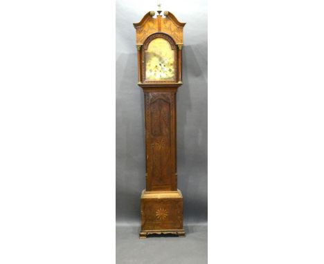 An Oak and Mahogany Longcase Clock the arched hood with swan neck pediment above a star inlaid door, raised upon ogee bracket