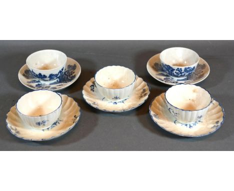 A Pair of First Period Worcester Tea Bowls and Saucers decorated in underglaze blue together with a similar set of three firs