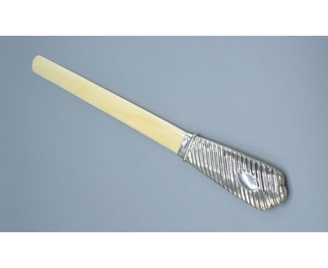 A Victorian Silver Mounted and Ivory Page Turner with shaped ribbed handle, 38 cms long60 