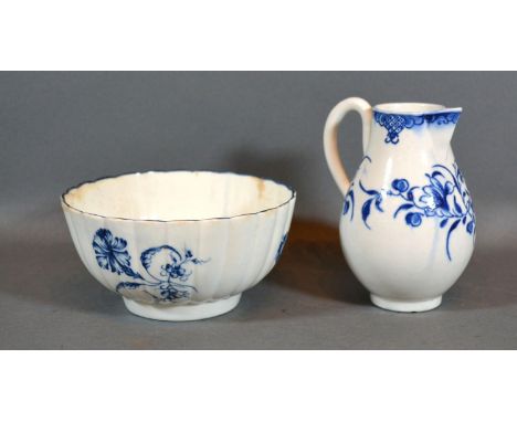 A First Period Worcester Cream Jug together with a similar small bowl 