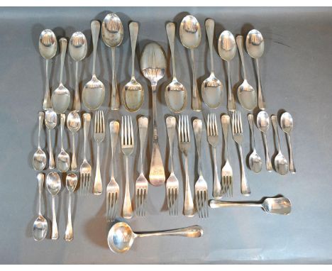 An Edwardian Canteen of Cutlery by Atkin Brothers comprising spoons, forks, basting spoon, caddy spoon, ladle and mustard spo