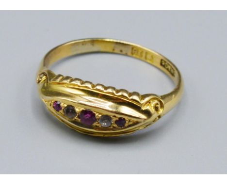 An 18ct Gold Dress Ring, set with red and white stones, 2.8 grams, ring size N 