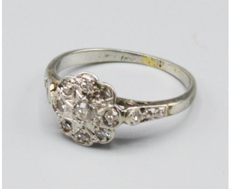 An 18ct White Gold Diamond Cluster Ring, 1.8 grams, ring size H 