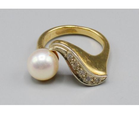 A Yellow Metal Dress Ring, set with a band of diamonds and single pearl, 5.8 grams, ring size K 