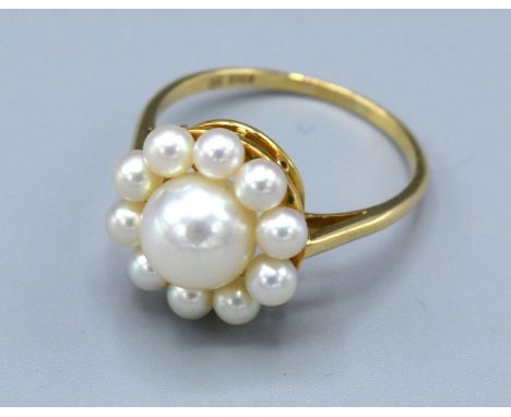A 14 ct. Gold Pearl Cluster Ring by Mikimoto, 3.2 gms. ring size Q 
