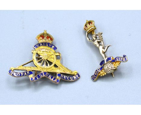 A 9ct. Gold Brooch in the form of a Royal Artillery Cap Badge with enamel decoration together with another similar 9ct. gold 