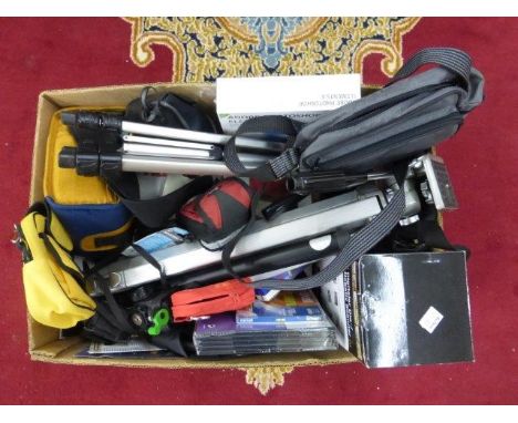 A box of camera accessories and equipment including cases, tripods etc.