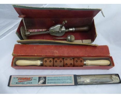 A Punkt-Roller fat reducer in original box, a boxed Timor ladies hair waving iron and a Veedee/Venivici vibratory massage ins