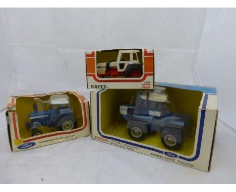 Three boxed Ertl & Ros die-cast tractor units: 1692 Case 2290, 1643 Ford TW20 2WD and 1926 Ford FW 60 Duals. 