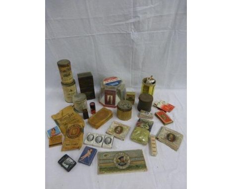 A selection of early and novelty tobacco packaging including Railroad Mills Sweet Scotch snuff and Egyptian Deities Cigarette