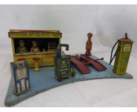 A good Marx tinplate forecourt model of a 'Roadside Rest Service Station'.