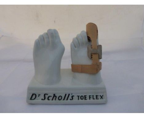 A Royal Doulton 'Dr Scholl's Toe Flex' ceramic feet shop display.