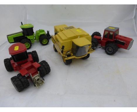 Four Ertl & Ros die-cast tractor units, Case IH 9150 duals, New Holland Combine, Massey Ferguson 4900 duals and  Steiger 1000