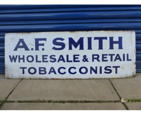 An A.F. Smith Wholesale and Retail Tobacconist rectangular enamel sign, 36 x 13". 