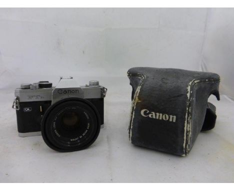 A Canon FTb camera with 50mm lens. 
