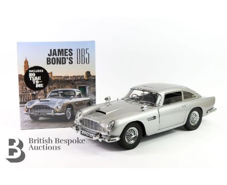 A detailed kit-built model car constructed from both metal and plastic parts, originally licensed by Eon Productions an Aston