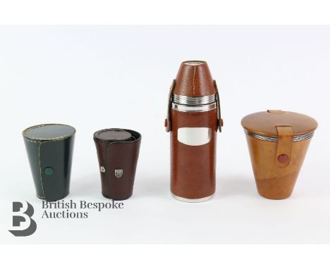 Various tot tumblers, including a set of four Denmar housed in a brown leather case; Marlborough flask with four tot tumblers