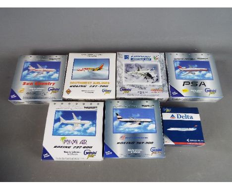 Gemini Jets - Seven boxed diecast 1:400 scale model aircraft by Gemini Jets, in various liveries. Lot includes Embraer ERJ-14