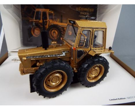 Universal Hobbies - A boxed Limited Edition diecast 1:32 scale Universal Hobbies County 1174 'Gold Edition -1979' Tractor. Th