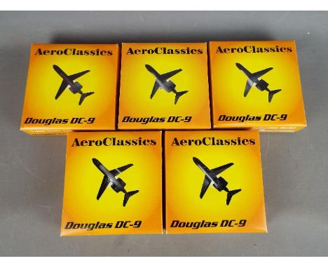 Aero Classics - Five boxed 1:400 scale diecast model Douglas DC-9 aeroplanes in various liveries, Trans World, North West, De