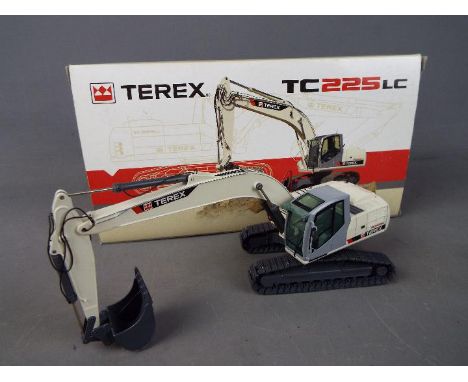 NZG - A boxed 1:50 scale diecast NZG #698 Terex TC225LC Crawler Excavator. Model appears to be in Mint condition presented in