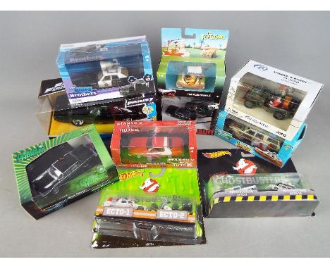 Jada, Greenlight, Hot Wheels - 10 boxed TV and Film related diecast model vehicles in various scales. Lot includes Greenlight
