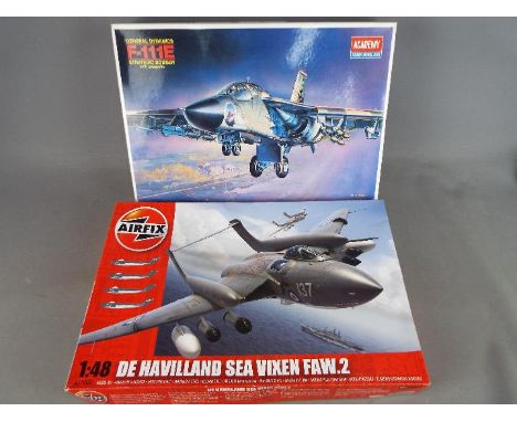 Academy, Airfix - Two boxed plastic model aircraft kits in 1:48 scale. Lot consists of Academy #1689 F-111E Strategic Bomber 