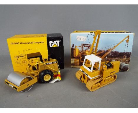 NZG, Conrad - NZG - Two boxed 1:50 scale diecast construction vehicles. Lot consists of NZG #401 Cat CS-563C Vibratory Soil C