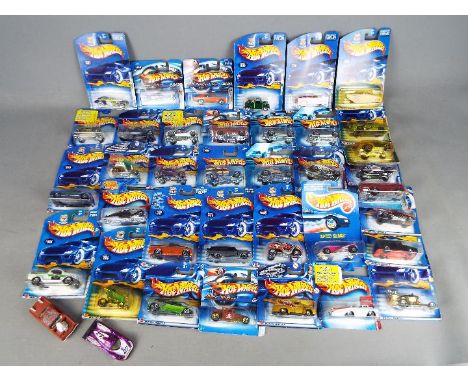Hot Wheels - 37 carded Hot Wheels diecast vehicles on long and short cards from various ranges. Lot includes Hot Wheels First