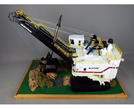 TWH Collectibles - An unboxed 1:50 scale TWH Collectibles Bucyrus 495 HF Electric Mining Shovel. This monster of a model appe