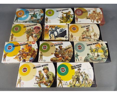 Airfix - A regiment of 11 boxed Airfix 1:32 scale plastic soldiers majority in 'Target' boxes. Lot includes German Winter Tro