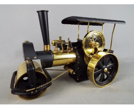 Wilesco - An unboxed Wilesco live steam D366 'Old Smoky' brass and black steam roller. The model has signs of display and use