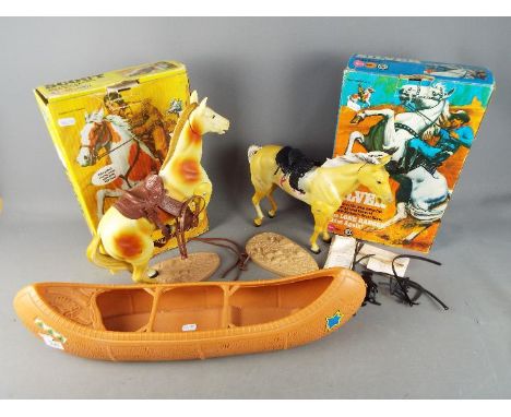 Marx - Two boxed 'The Lone Ranger' horses including 'Silver' and 'Scout' and an unboxed Canoe attributed to Marx. Items have 