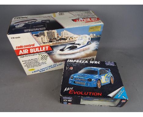 Nikko - Two boxed radio controlled model vehicles by Nikko. Lot includes a vintage Nikko 1:18 scale Air Bullet Hovercraft wit