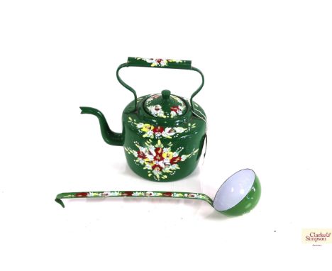 A painted bargeware type kettle and ladle with floral decoration