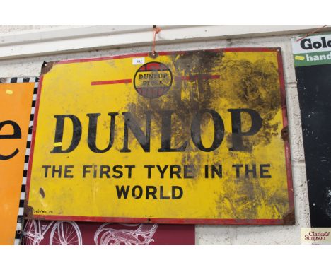 An enamel "Dunlop" sign, approx. 30" x 20"